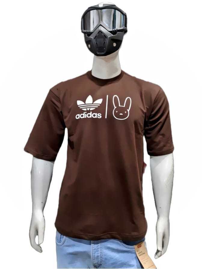 Stand out in style with this trendy brown Adidas-inspired T-shirt featuring a playful bunny print.